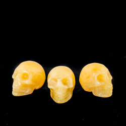 Crâne sculpté Calcite jaune env. 25x17mm
