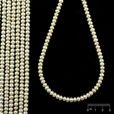 Rang Perles de culture d'eau douce rondelles blanches
