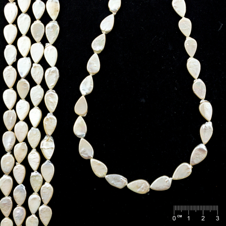 Rang Perles de culture d'eau douce blanches avec noyau