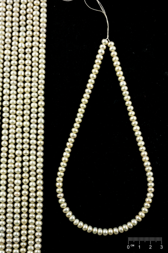 Rang Perles de culture d'eau douce rondelles blanches